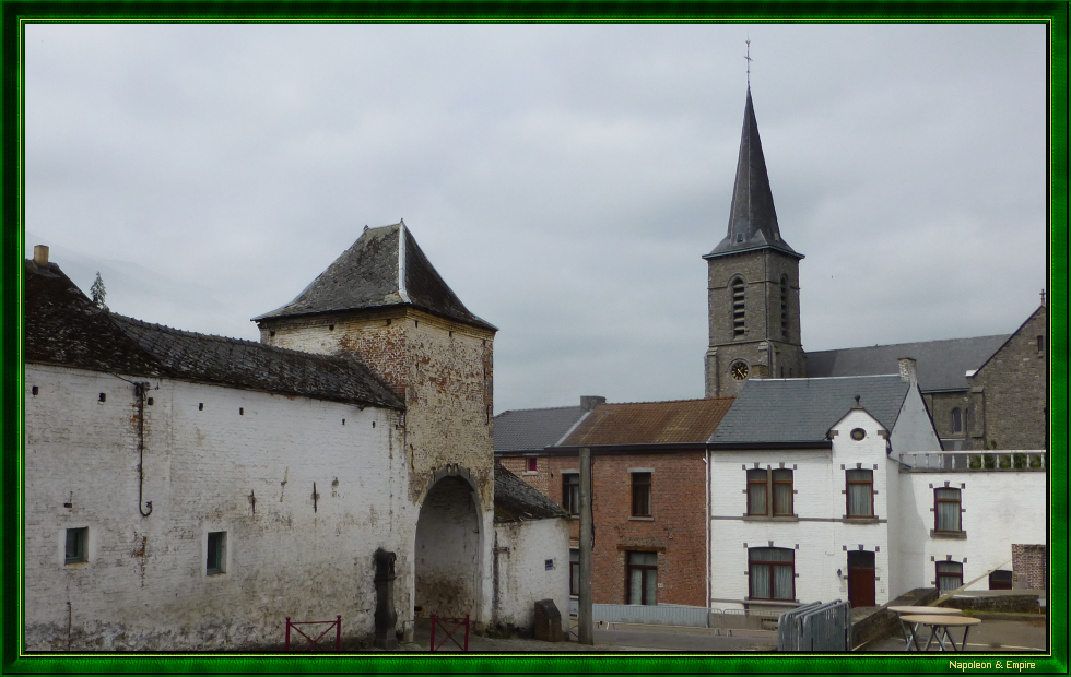 Ferme d'En-Haut and church in Ligny
